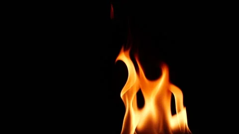 Slow motion closeup campfire burn on black background, fire flame design element Stock Footage 148608727