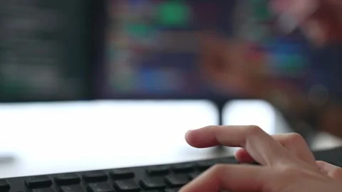 Slow motion closeup hand of back end software developer writing code. Burgeoning Stock Footage 271080078
