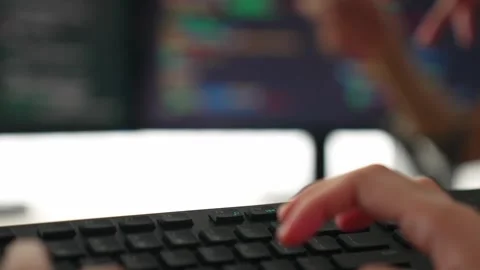 Slow motion closeup hand of back end software developer writing code. Burgeoning Stock Footage 274593040
