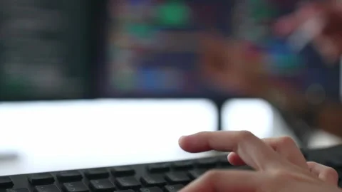 Slow motion closeup hand of back end software developer writing code. Burgeoning Stock Footage 276147557