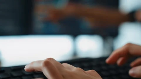 Slow motion closeup hand of back end software developer writing code. Burgeoning Stock Footage 277023707