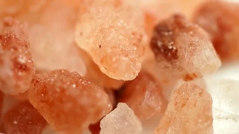 Slow motion closeup macro of delicious red pink Himalayan salt Stock Footage 75521394