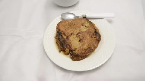 Slow-motion closeup pan of toronjas - sweet wine-soaked Easter Week bread w.. Stock-Footage 306728225