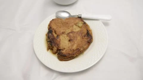Slow-motion closeup pan of toronjas - sweet wine-soaked Easter Week bread w.. Vídeo Stock 306728226