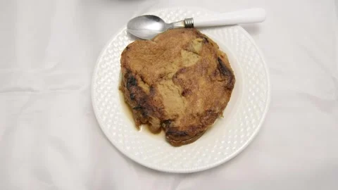 Slow-motion closeup pan of toronjas - sweet wine-soaked Easter Week bread w.. Vídeo Stock 306728227