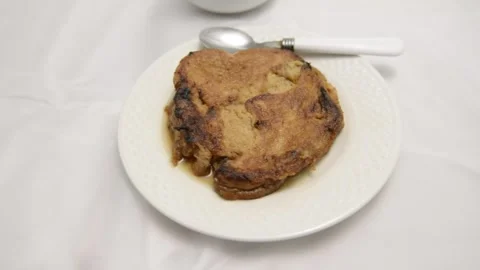 Slow-motion closeup pan of toronjas - sweet wine-soaked Easter Week bread w.. Vídeo Stock 306728243