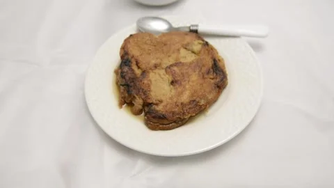 Slow-motion closeup pan of toronjas - sweet wine-soaked Easter Week bread w.. Vídeo Stock 306728244