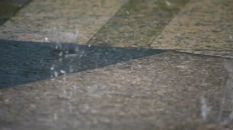 Slow motion:A closeup shot of heavy rain on water Stock Footage 52294283