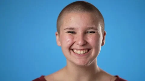 Slow motion closeup smiling young gender fluid non binary woman 20s years old Stock Footage 221252857