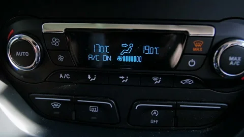 Slow motion closeup video of drivers hand pressing knobs on dashboard and 스톡 동영상 107448272
