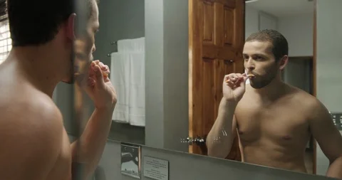 Slow Motion Closeup of Young Man Brushing His Teeth Toothbrush Stock Footage 100386563