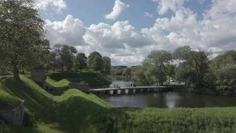 Slow motion clouds above the Kastellet moat and footbridge Stock Footage 341288943