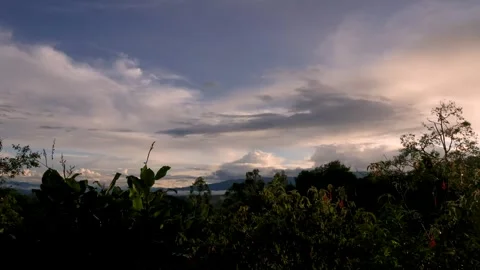 The slow motion of the clouds in the last minutes of the sunset Stock Footage 334576742