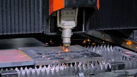 Slow motion: cnc plasma cutting machine is operating on sheet metal with sparks Stock Footage 341853256