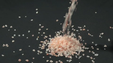 Slow Motion Coarse Pink Himalayan Salt Falling On Dark Background Stock Footage 331856532