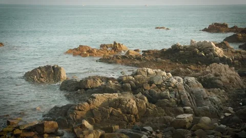 Slow Motion Coastal Rocks and Calm Sea Along the China Coast Stock Footage 342370139