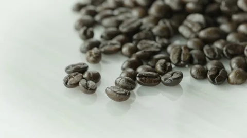 A Slow Motion Coffee Bean Mound Pour 스톡 동영상 71278686