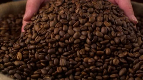 Slow motion coffee beans being poured Stock-Footage 59785716