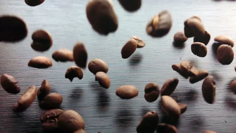 Slow motion coffee beans falling Stock Footage 88656510