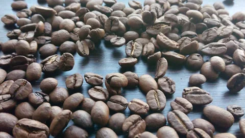 Slow motion coffee beans falling Stock Footage 88671319