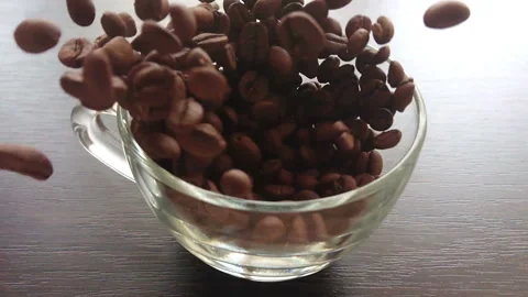 Slow motion coffee beans falling 스톡 동영상 88672221