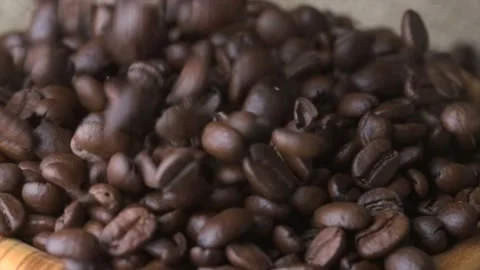 Slow motion of coffee beans	 Stock Footage 157991226