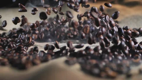 Slow Motion Coffee Beans Splash with Steam Video stock 91144914