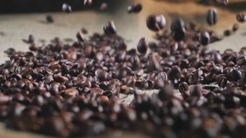 Slow Motion Coffee Beans Splash on Bagging Stock Footage 91145972