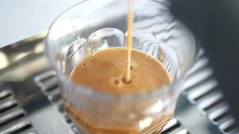 Slow Motion of coffee drop from espresso machine close up Stock Footage 156708891