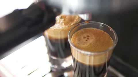 Slow Motion of coffee drop from espresso machine close up Stock Footage 166871841