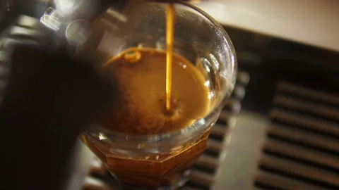 Slow Motion of coffee drop from espresso machine close up Stock Footage 167294727