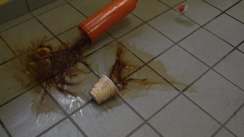 Slow Motion of Coffee Falling to the Floor HD Video Stock Footage 90717528