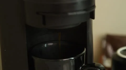 Slow motion coffee machine brewing Stock Footage 22696274