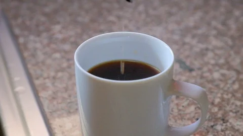 Slow motion coffee pour Stock Footage 93968099