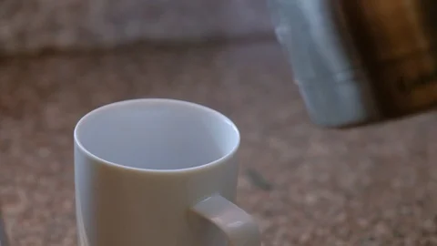 Slow motion coffee pour Stock Footage 93968342