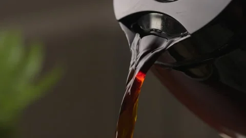 Slow motion coffee pours from a pitcher or coffee pot Stock-Footage 237549852