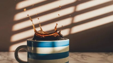https://images.pond5.com/slow-motion-coffee-spill-footage-087491543_iconl.jpeg
