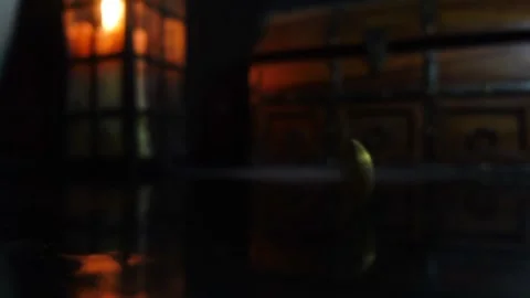 Slow Motion Coin Spinning against historical background Stock Footage 333609576