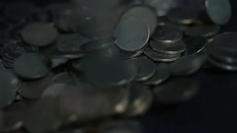 Slow motion coins falling. Stock Footage 148702242