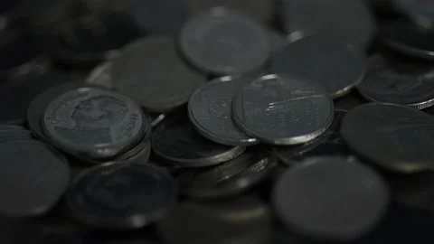 Slow motion coins falling. Stock Footage 148702332
