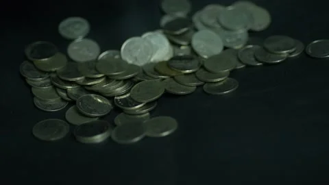 Slow motion coins falling. Stock Footage 148702438