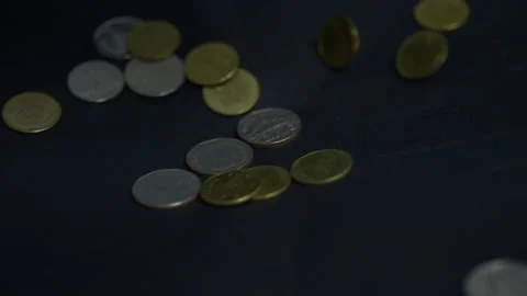 Slow motion coins falling. Stock Footage 148702457