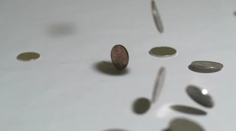 Slow Motion Coins Falling on White Background Stock Footage 36028384