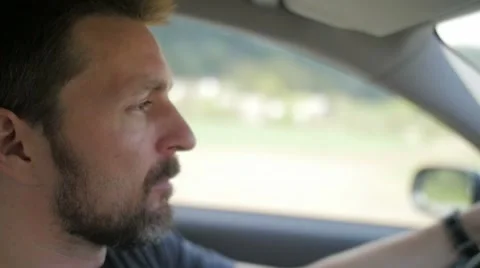 Slow motion of a concerned man driving Video stock 49752138