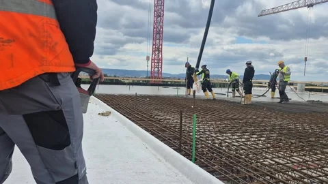Slow Motion Concrete Pouring with Pump Remote Control Stock Footage 338226968