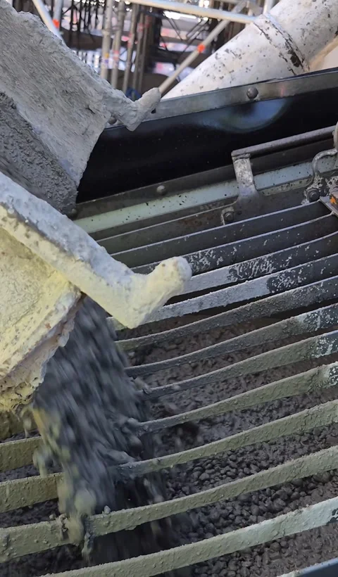 Slow motion of concrete pouring vertical video Stock-Footage 335999624