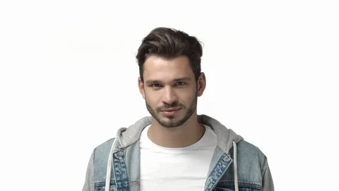Slow-motion confident and assertive handsome bearded male in casual clothes Stock Footage 121724954