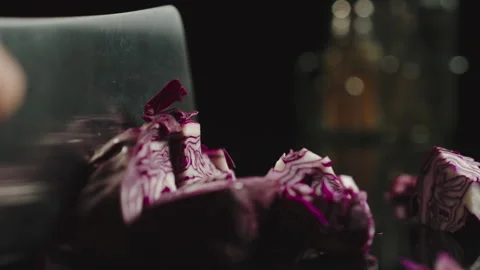 SLOW MOTION: Cook Cutting A Red Cabbage On A Black Table Stock Footage 161687924