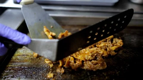 Slow-Motion of Cook Frying Minced Meat in Sauce and Spices on Stove Stock Footage 288576533