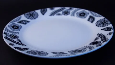 SLOW MOTION: Cooked tortiglioni fall into full plate Penne pasta with reach Video stock 101739748